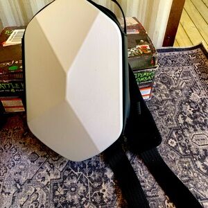 Oculus hard shell sling bag